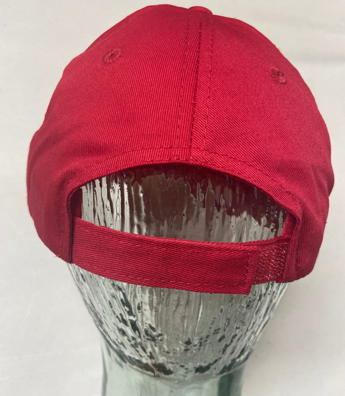 The back of a Youth-size Structured Ball Cap, showing an adjustable velcro closure. 