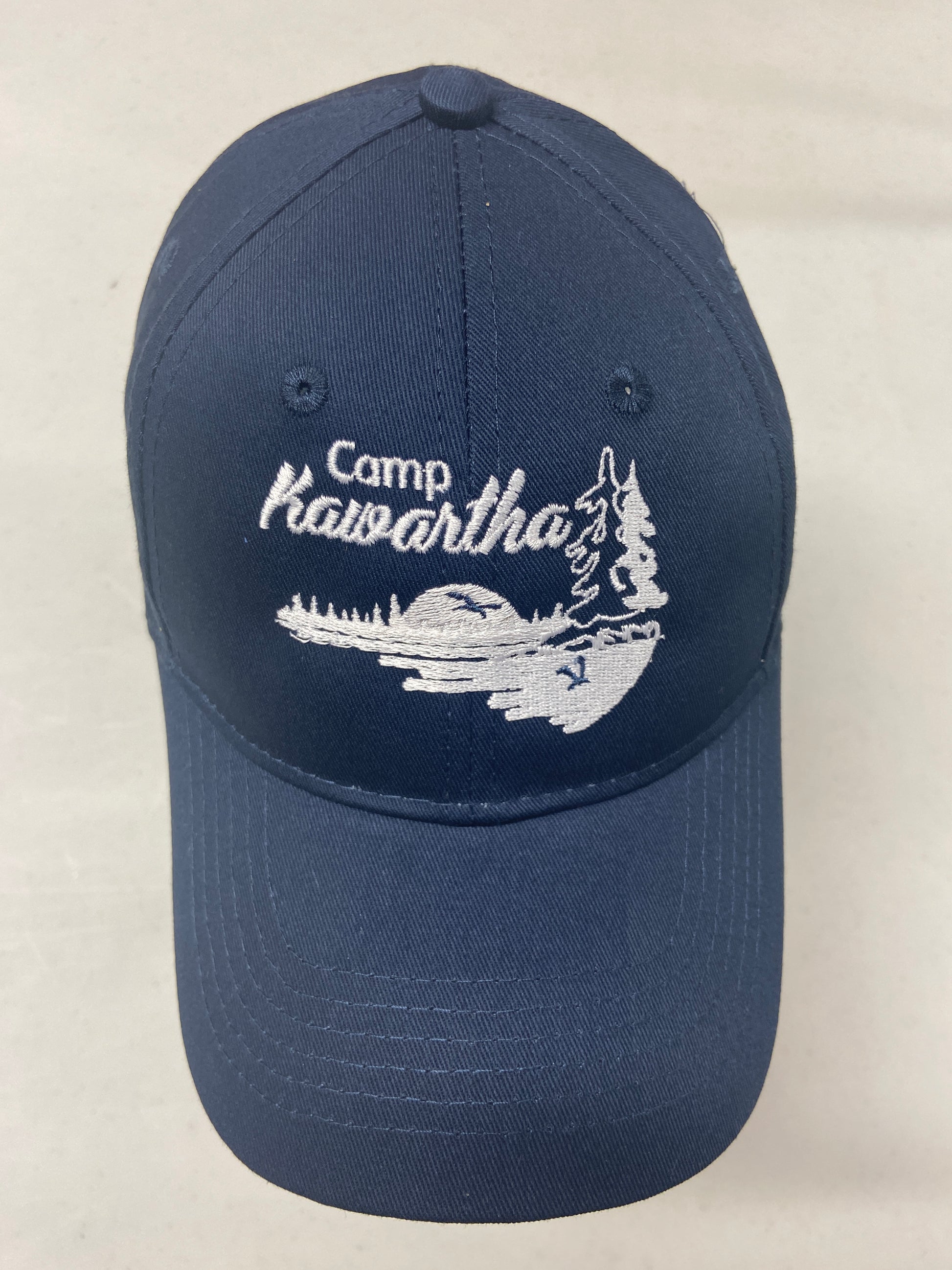 Youth-sized structured ball cap in navy.